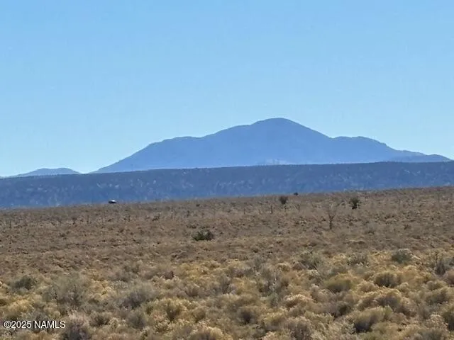 a view of an outdoor space and mountain view