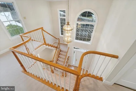 a view of staircase with large window