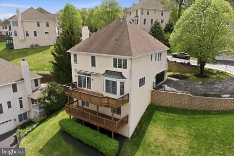 an aerial view of a house with a garden