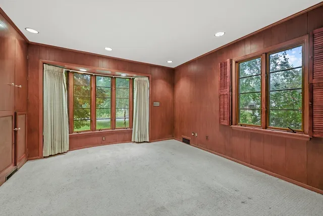 a big room with wooden walls