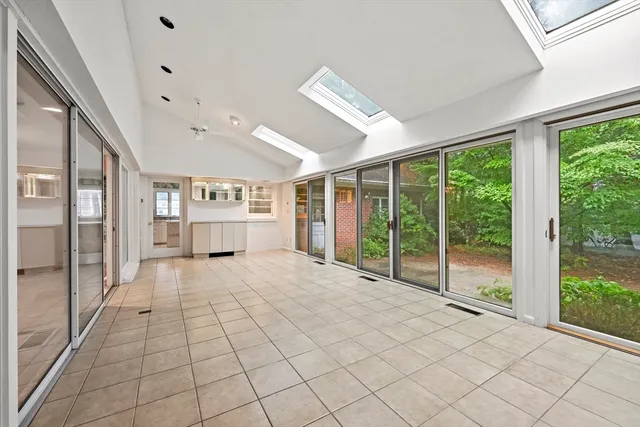 a large white room with windows