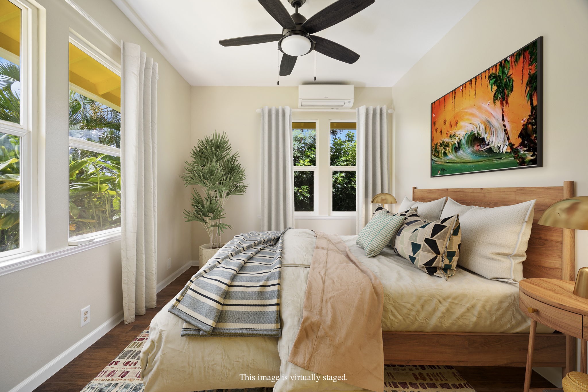 210 Eggerking Road Kapaa, HI 96746 - Photo 12 of 30 a bed sitting in a bedroom next to a window