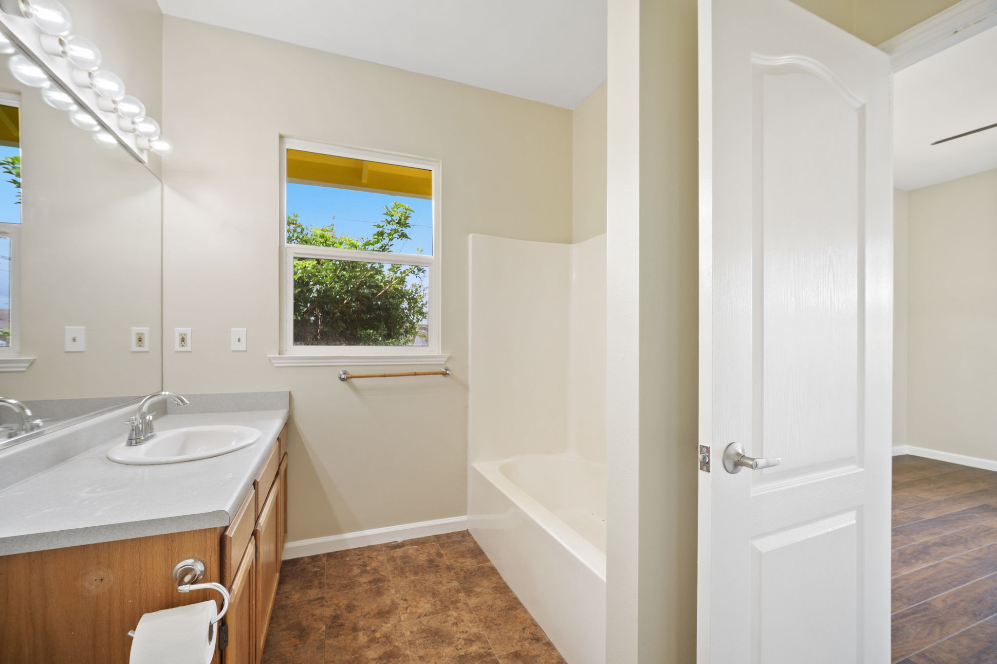 210 Eggerking Road Kapaa, HI 96746 - Photo 15 of 30 a bathroom with a sink a vanity and a mirror