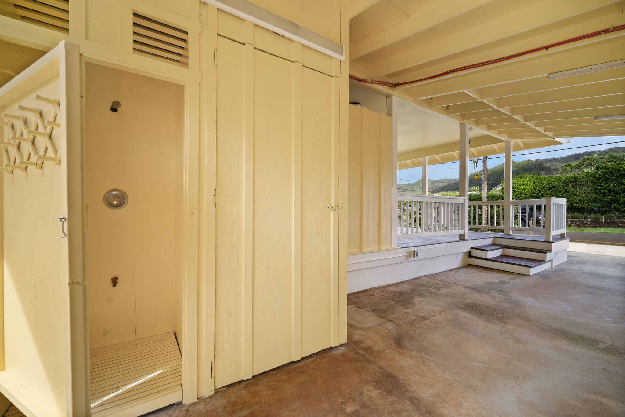 210 Eggerking Road Kapaa, HI 96746 - Photo 22 of 30 a view of an outdoor space with porch
