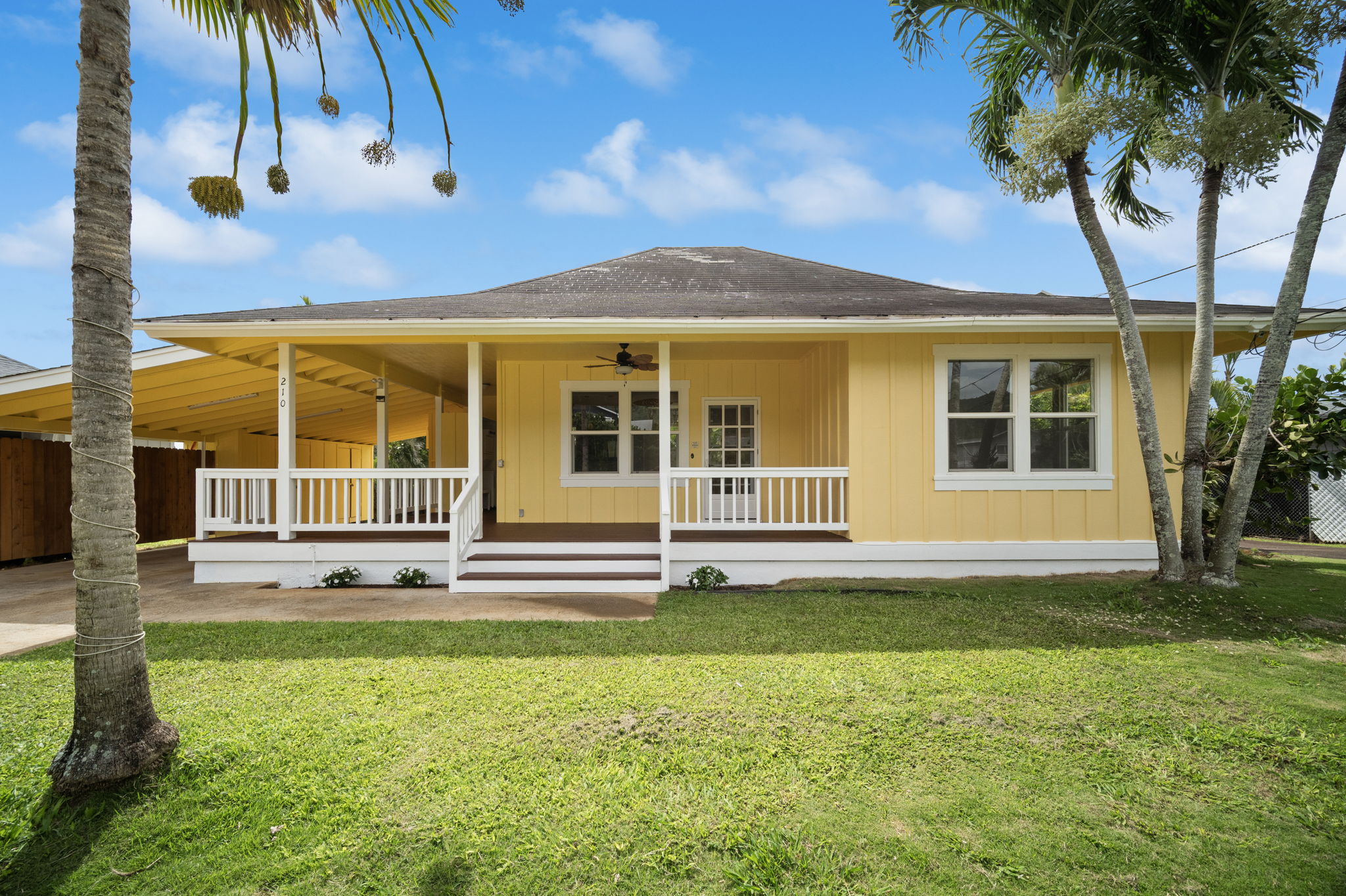 210 Eggerking Road Kapaa, HI 96746 - Photo 25 of 30 a front view of a house with a garden