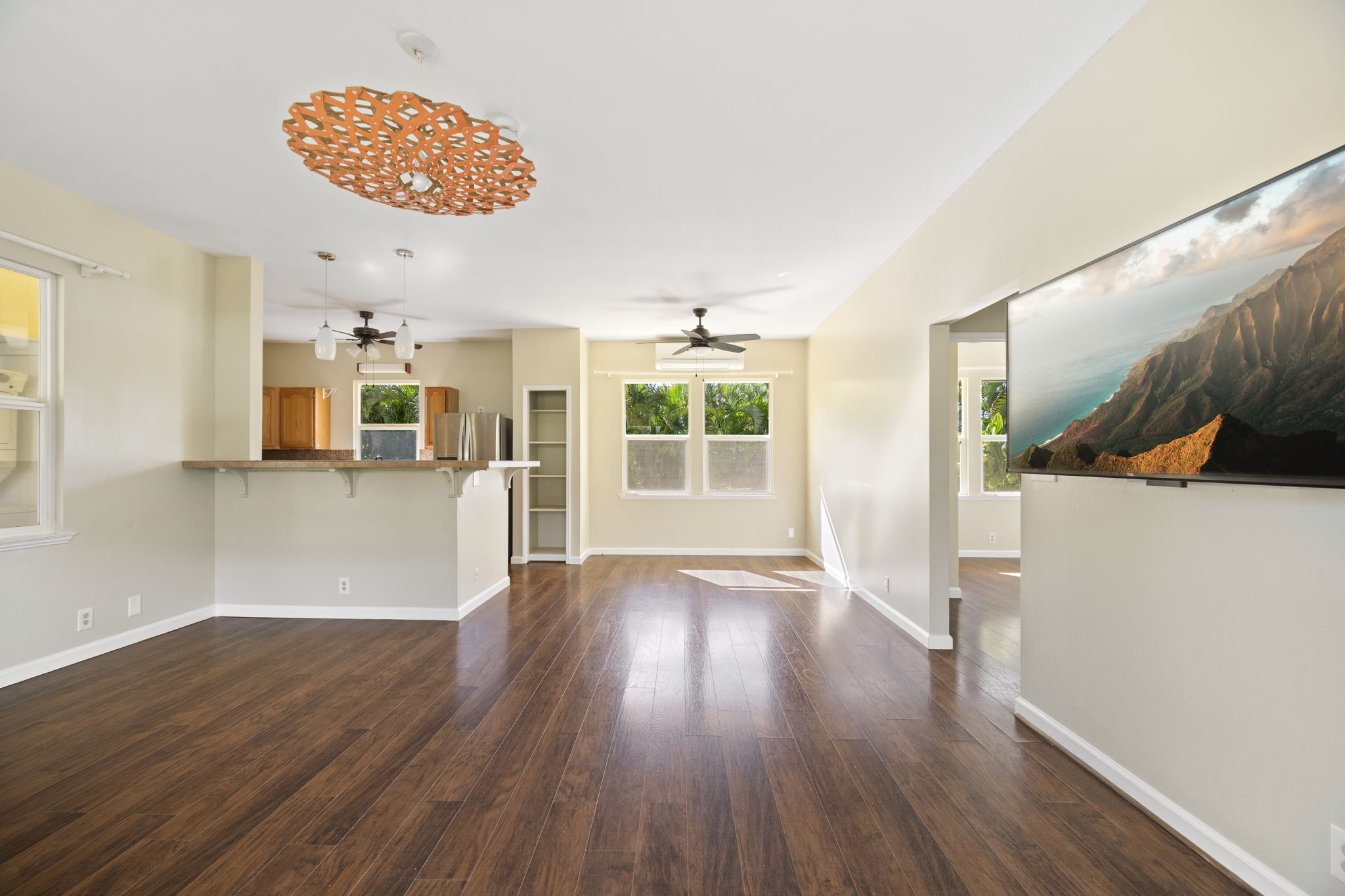210 Eggerking Road Kapaa, HI 96746 - Photo 6 of 30 a view of a kitchen with wooden floor and a sink