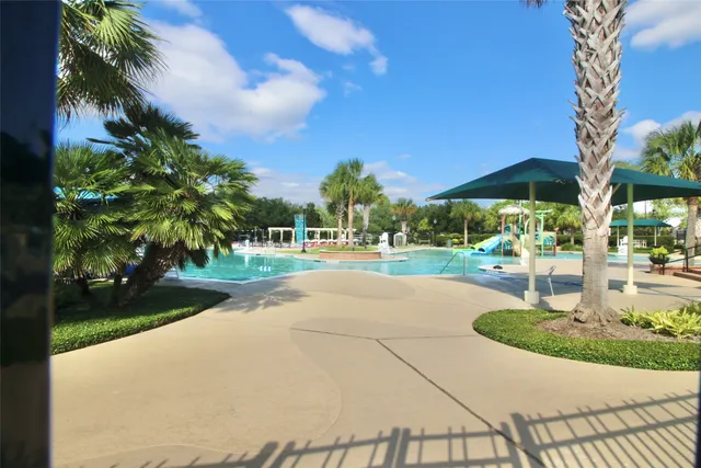 a view of a garden with a fountain