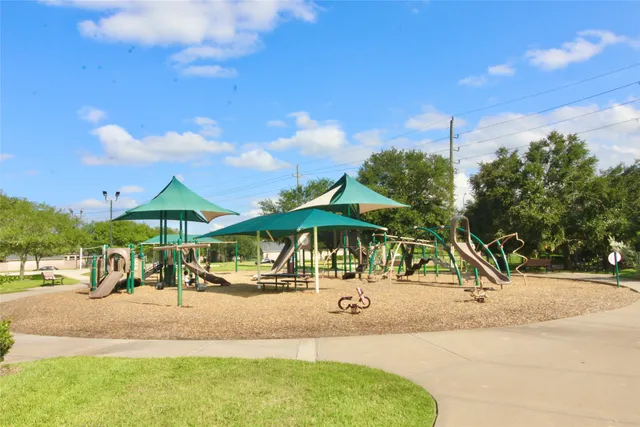 a view of outdoor space with garden and patio