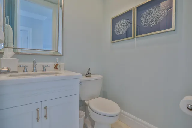 a spacious bedroom with a bed and glass window