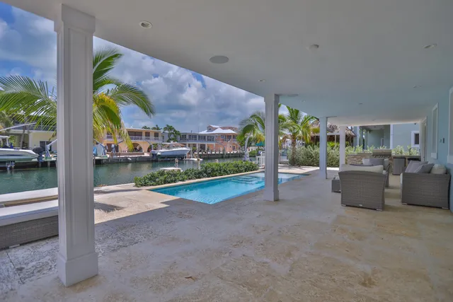 a picture of a lake with a building in front of it