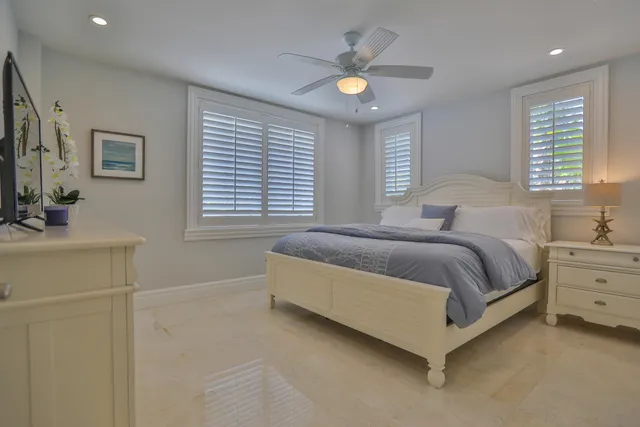 a kitchen with sink stove and cabinets