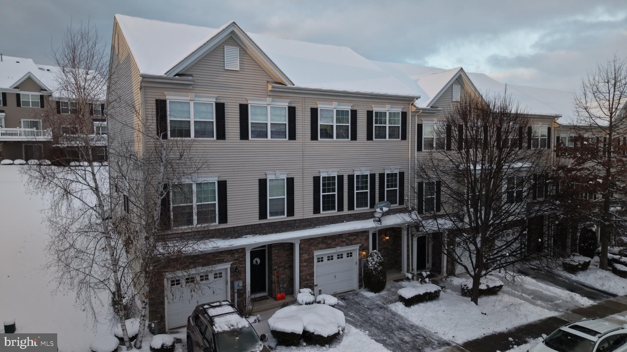 4079 Yorktown Road Coopersburg, PA 18036 - Photo 2 of 26 Charming townhome blanketed in winter snow.