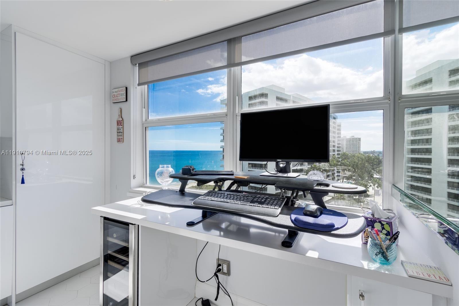 1200 South Ocean Boulevard, Unit 9F Boca Raton, FL 33432 - Photo 8 of 55 a room with furniture and a flat screen tv