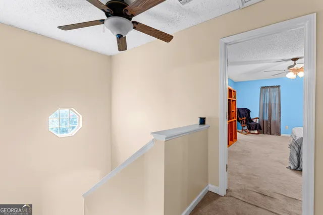 a view of a livingroom with a staircase