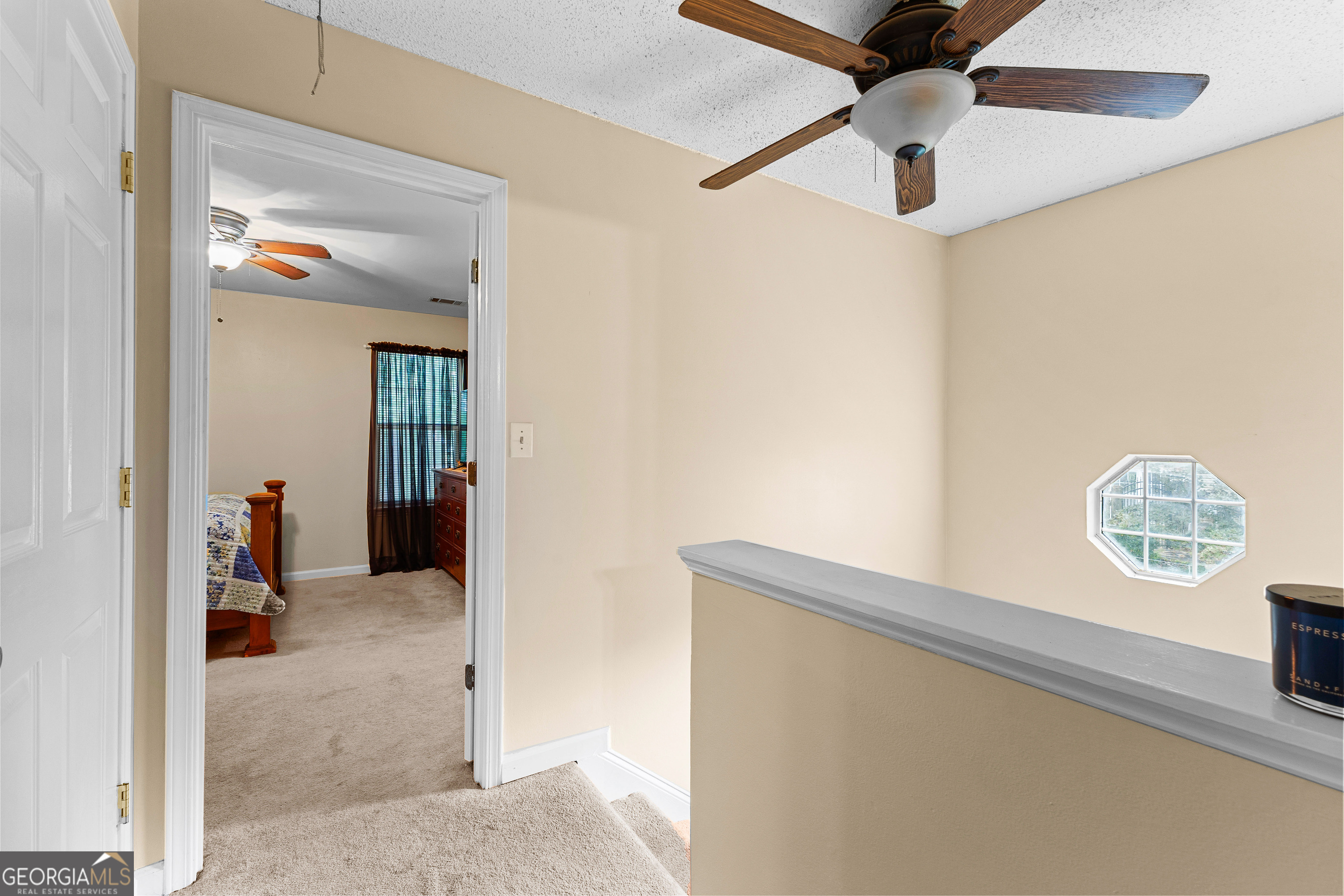 145 Greison Trail Newnan, GA 30263 - Photo 20 of 28 an entryway with a chandelier fan