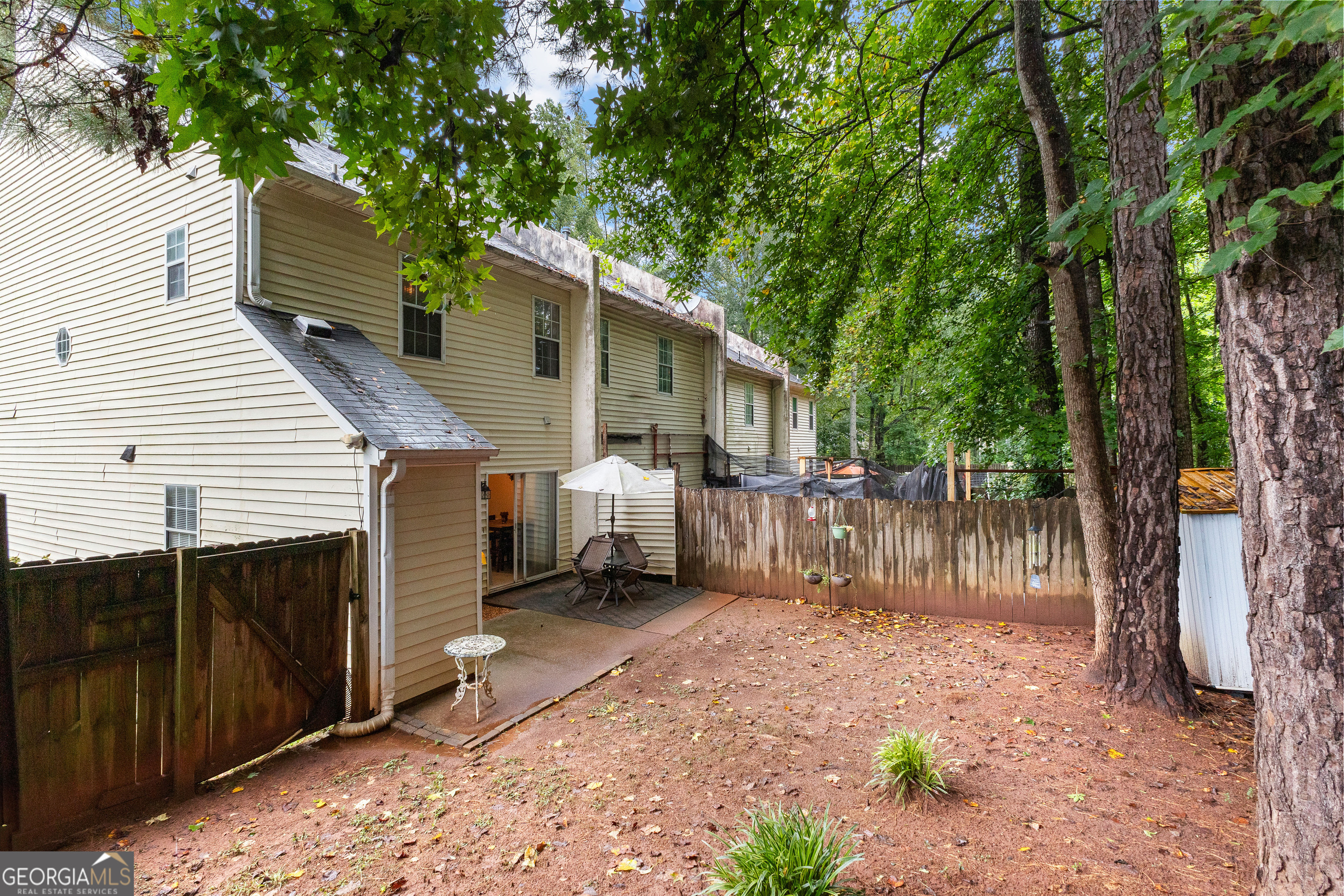 145 Greison Trail Newnan, GA 30263 - Photo 27 of 28 a backyard of a house with lots of water fountain