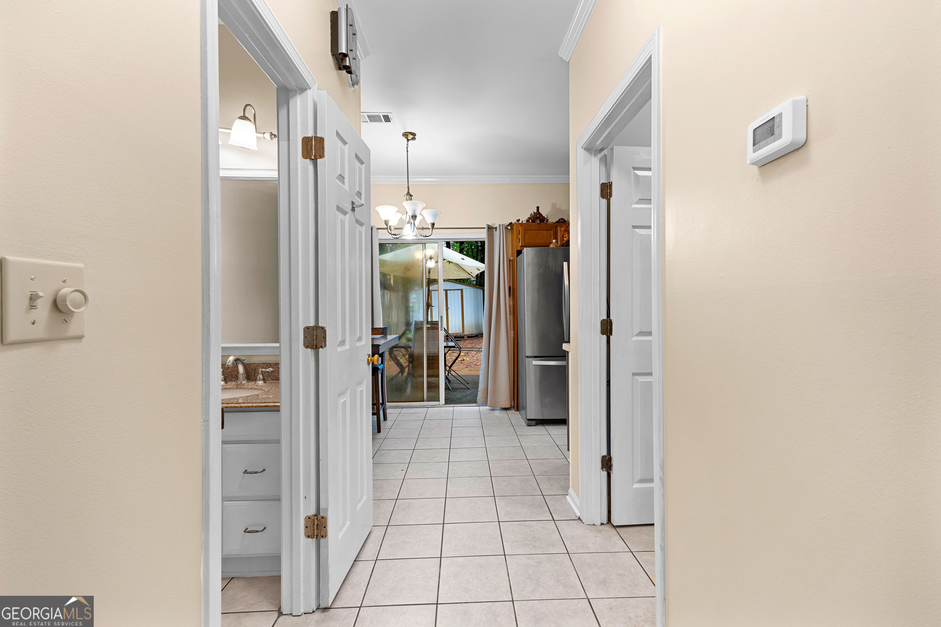 145 Greison Trail Newnan, GA 30263 - Photo 6 of 28 a view of a hallway with a living room