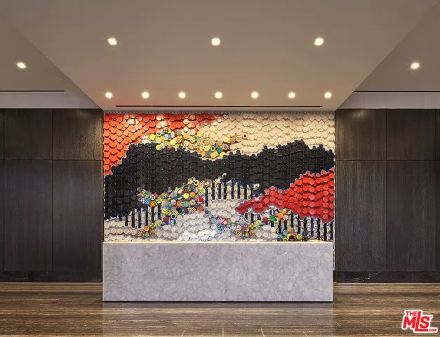 a bathroom with a double vanity sink toilet mirror and shower
