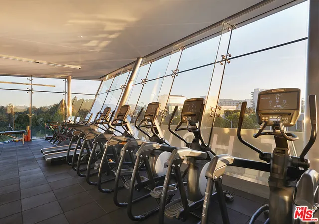 a view of balcony with furniture