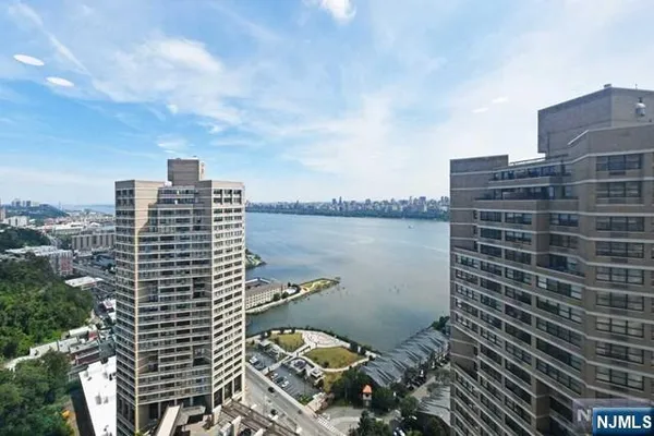 a view of a city with tall buildings