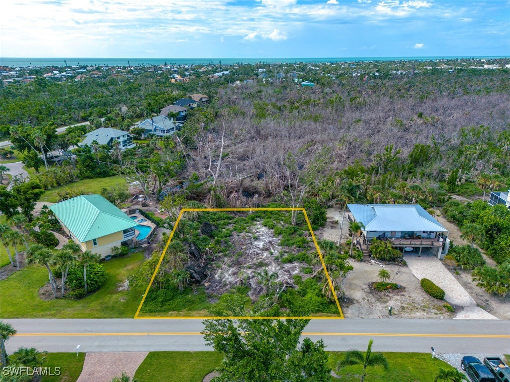 1032 Sand Castle Road Sanibel, FL 33957 - Photo 12 of 15 an aerial view of multiple house
