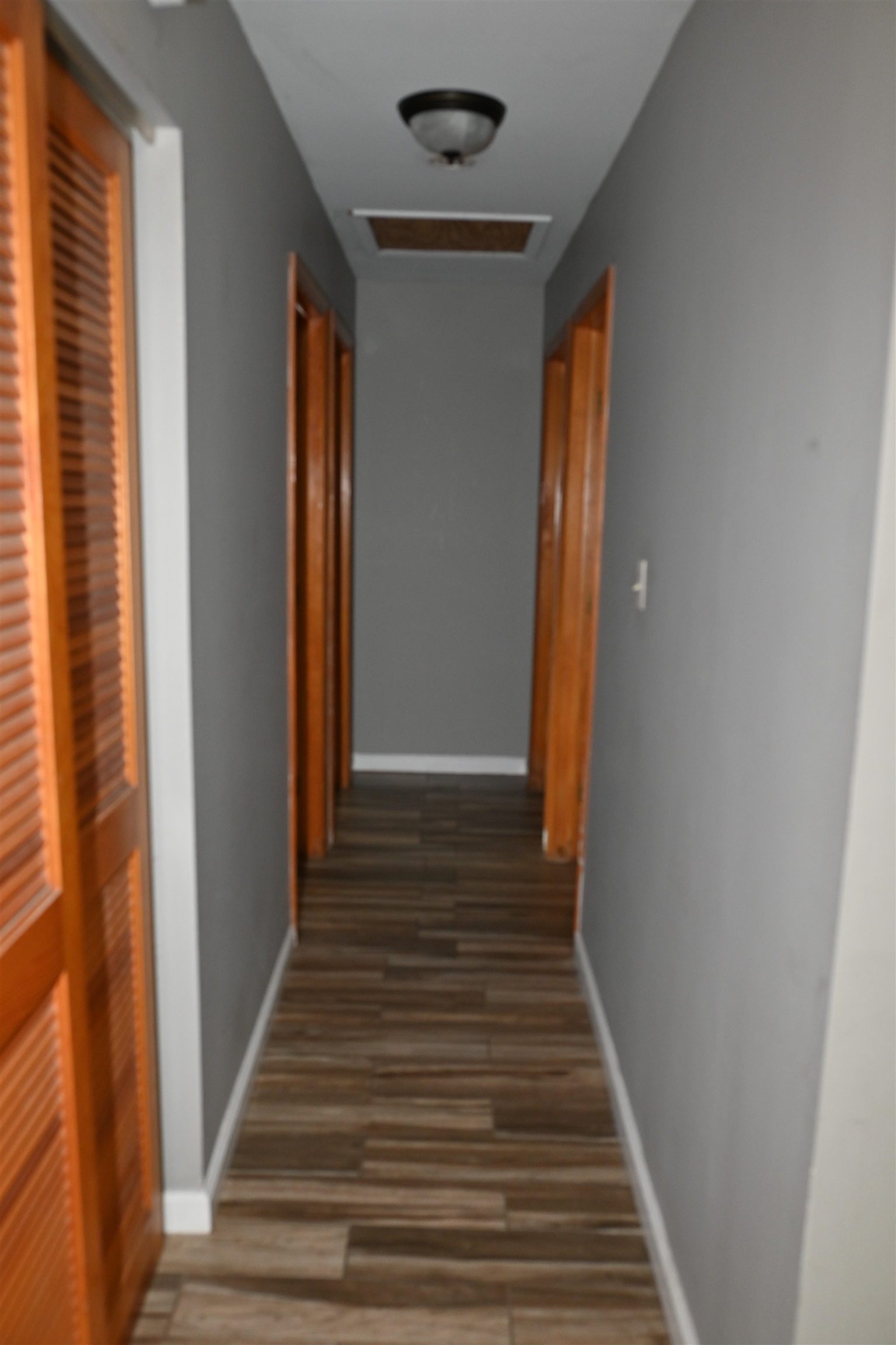 177 West Briarcliff Road Bolingbrook, IL 60440 - Photo 8 of 20 a view of a hallway with wooden floor and staircase
