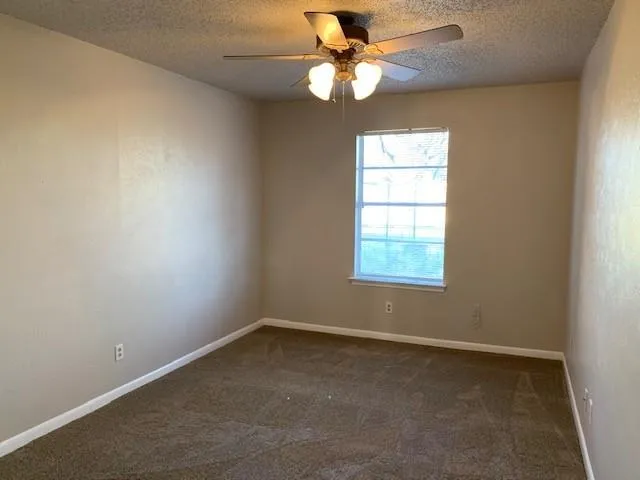 an empty room that has a window