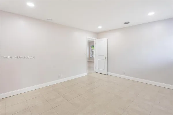 an empty room with an entryway
