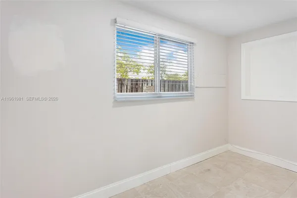 an empty room with a window