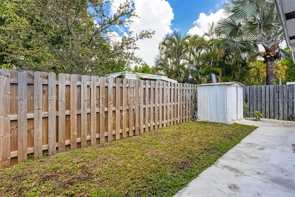 a view of a wooden fence