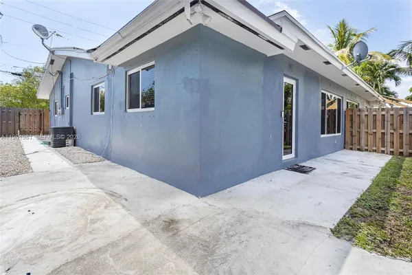 a view of backyard of a house