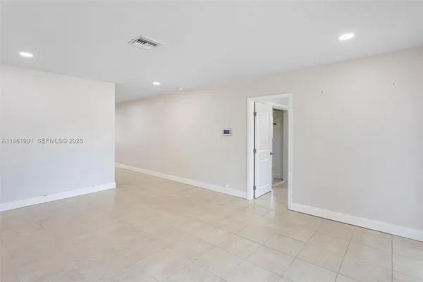 an empty room with an entryway