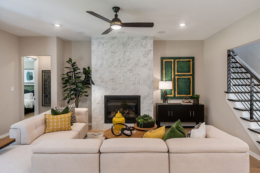 1212 Scenic Grn Loop Georgetown, TX 78628 - Photo 24 of 36 a living room with furniture and a fireplace