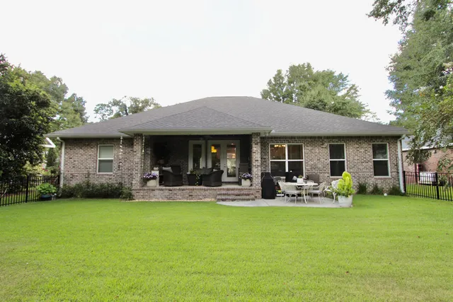 a front view of a house with patio