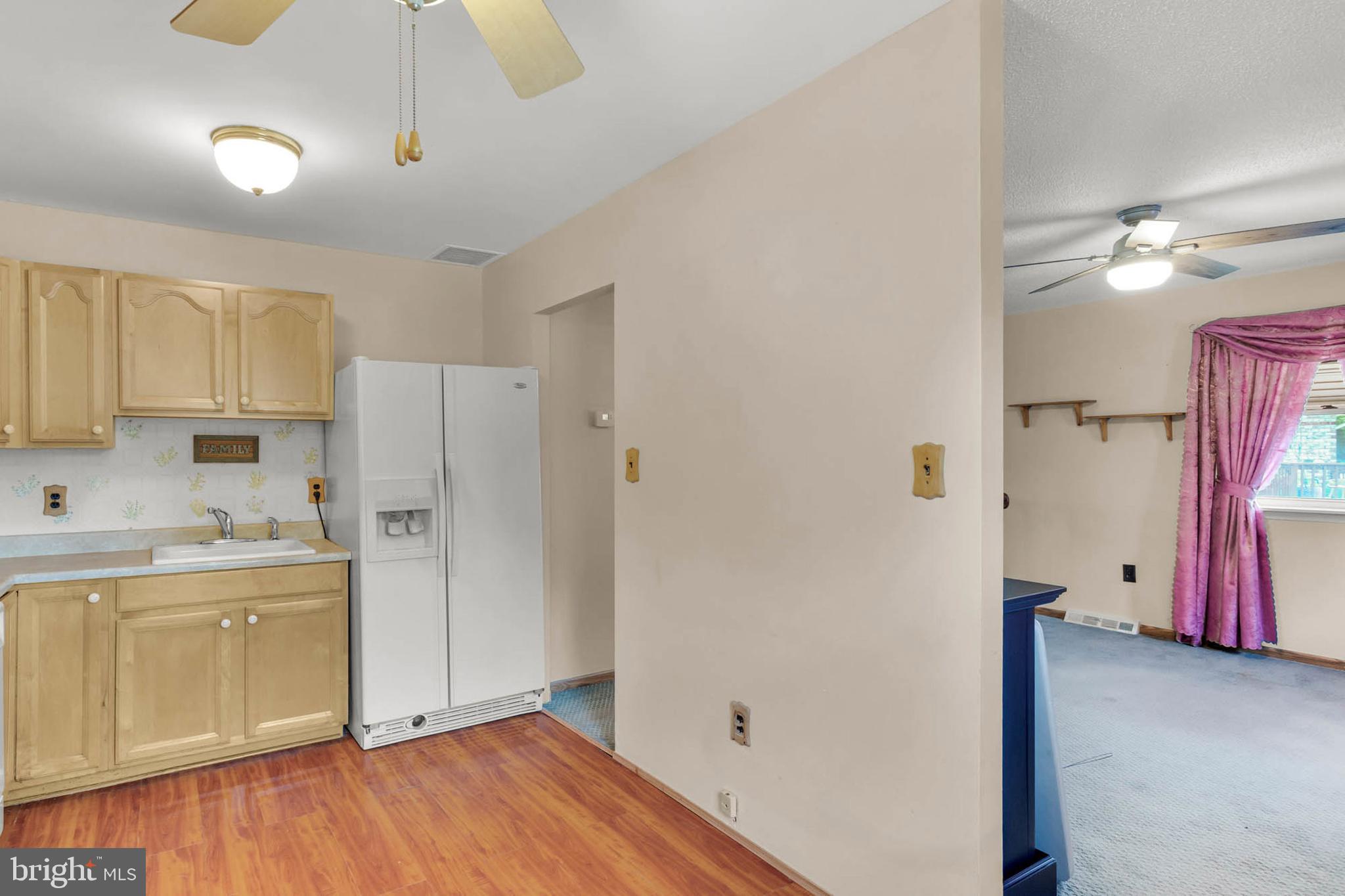 179 Dunlap Road Pasadena, MD 21122 - Photo 11 of 36 Kitchen opens to Dining Room