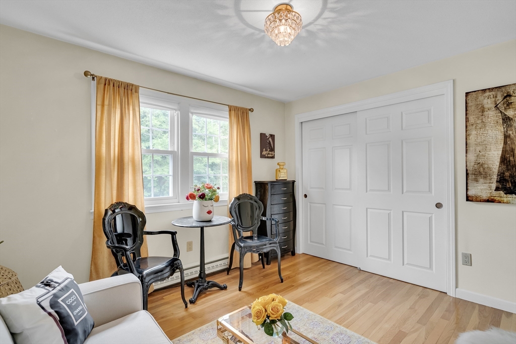 71 Stone Street, Unit 5 Walpole, MA 02081 - Photo 15 of 18 a view of a workspace with furniture and a window