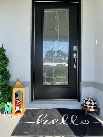 a bathroom with a tub and a window