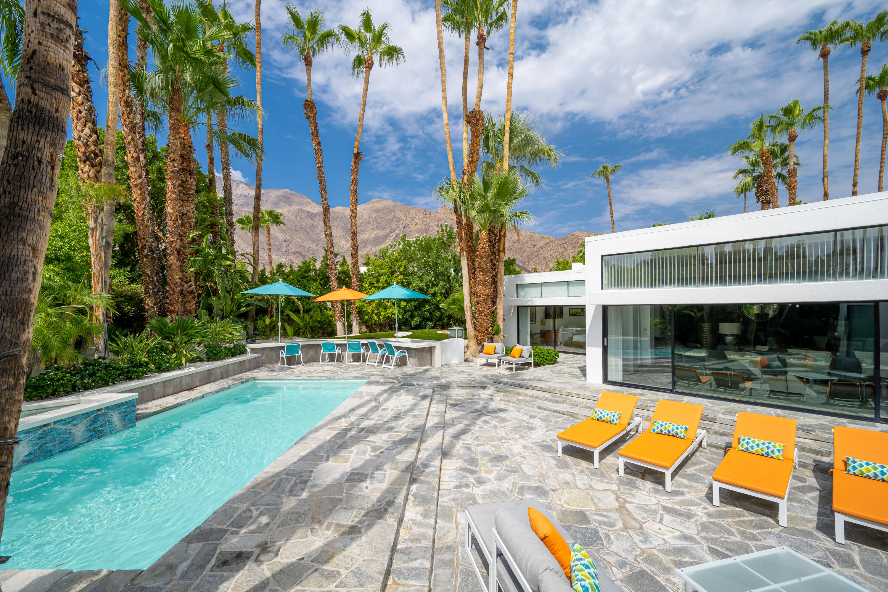 swimming pool with outdoor seating