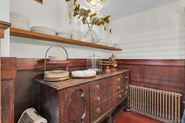 a room with a sink and cabinets