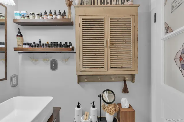 a bathroom with a toilet and a sink