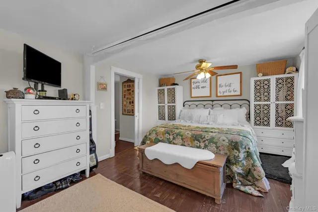 a kitchen with a refrigerator a sink and cabinets