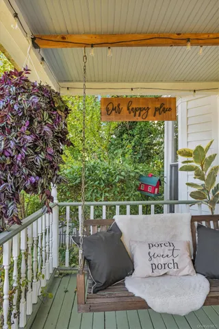 a bathroom with a toilet a sink and a mirror