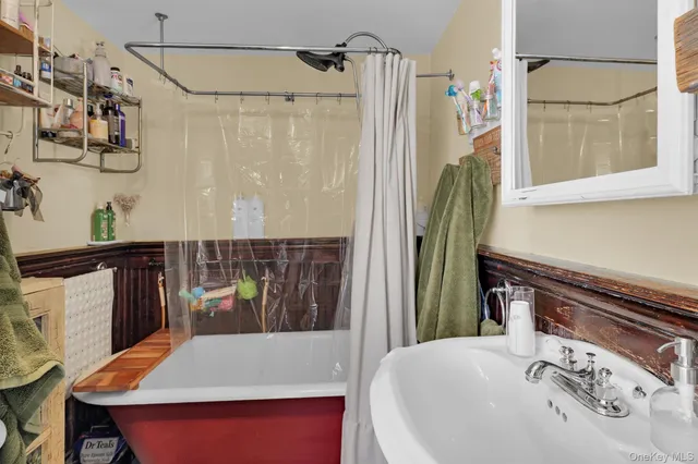 a view of a backyard with sitting area