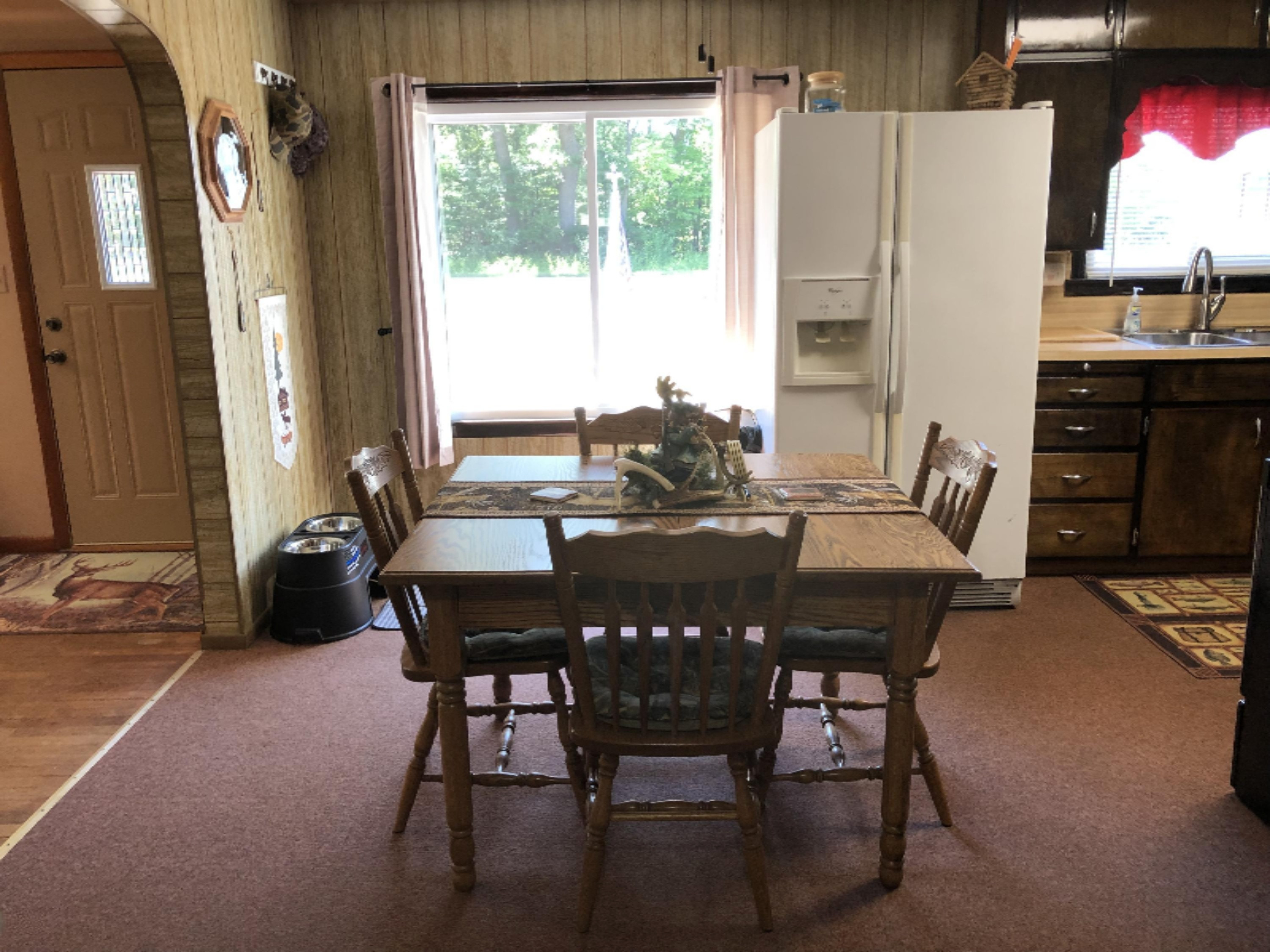 4219 North High Bridge Road Brethren, MI 49619 - Photo 9 of 36 Dinning area with natural light