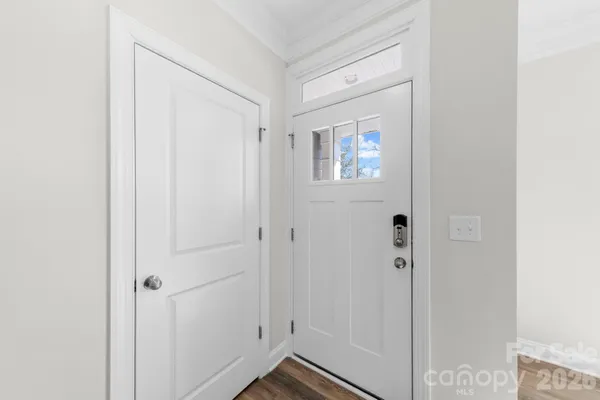 a bathroom with a toilet a sink and shower