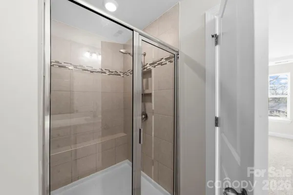 a view of a room with white walls