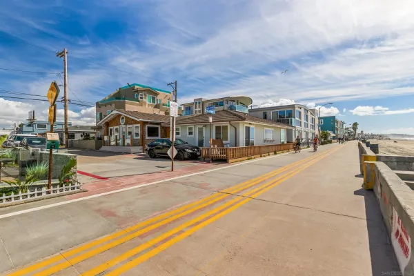 a view of a swimming pool with an outdoor seating