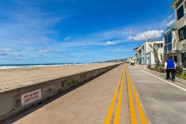 an aerial view of residential building and ocean