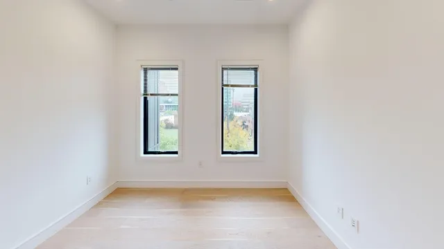 an empty room with windows