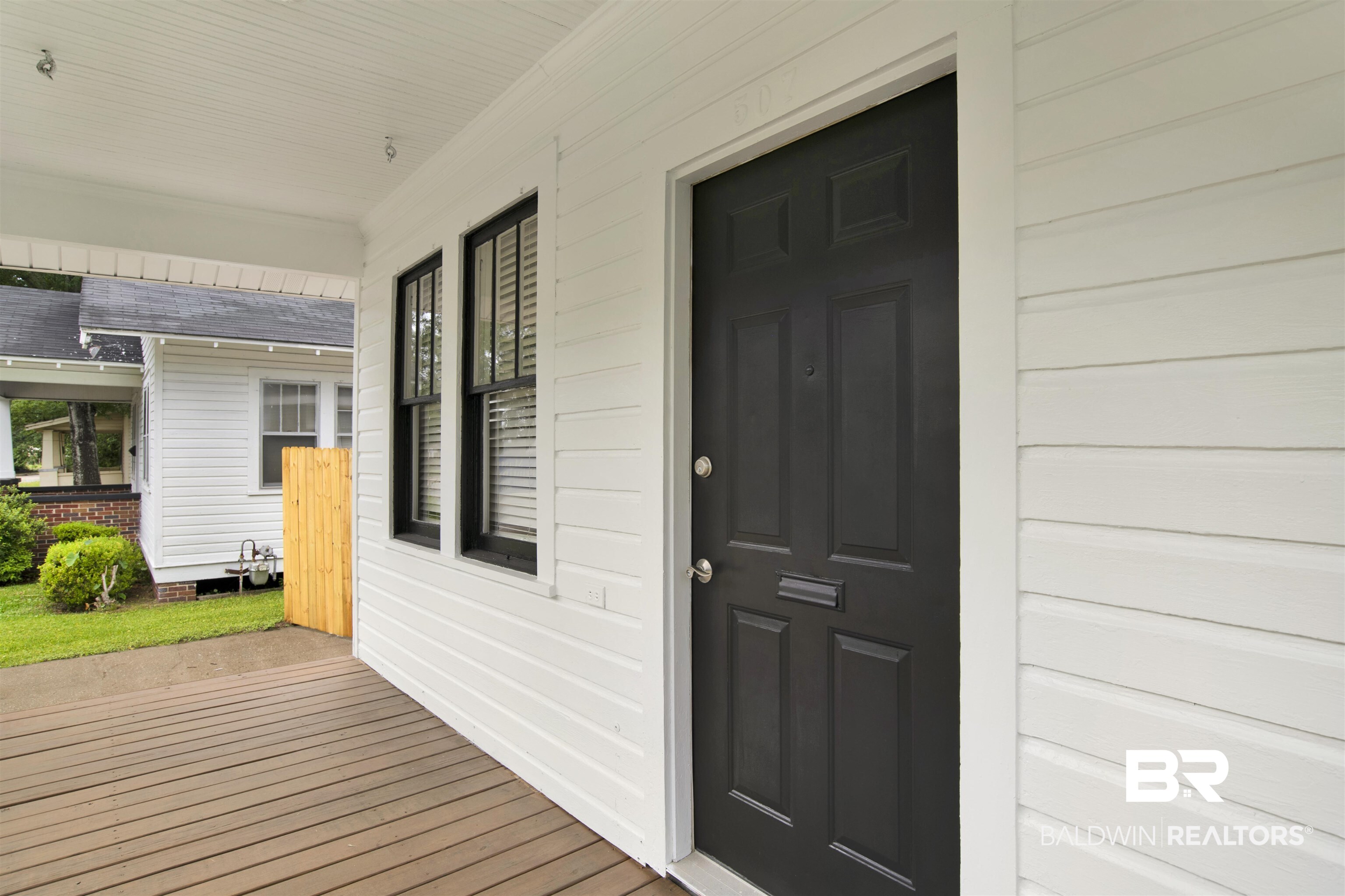 507 Holcombe Avenue Mobile, AL 36606 - Photo 5 of 28 Doorway to property featuring covered porch